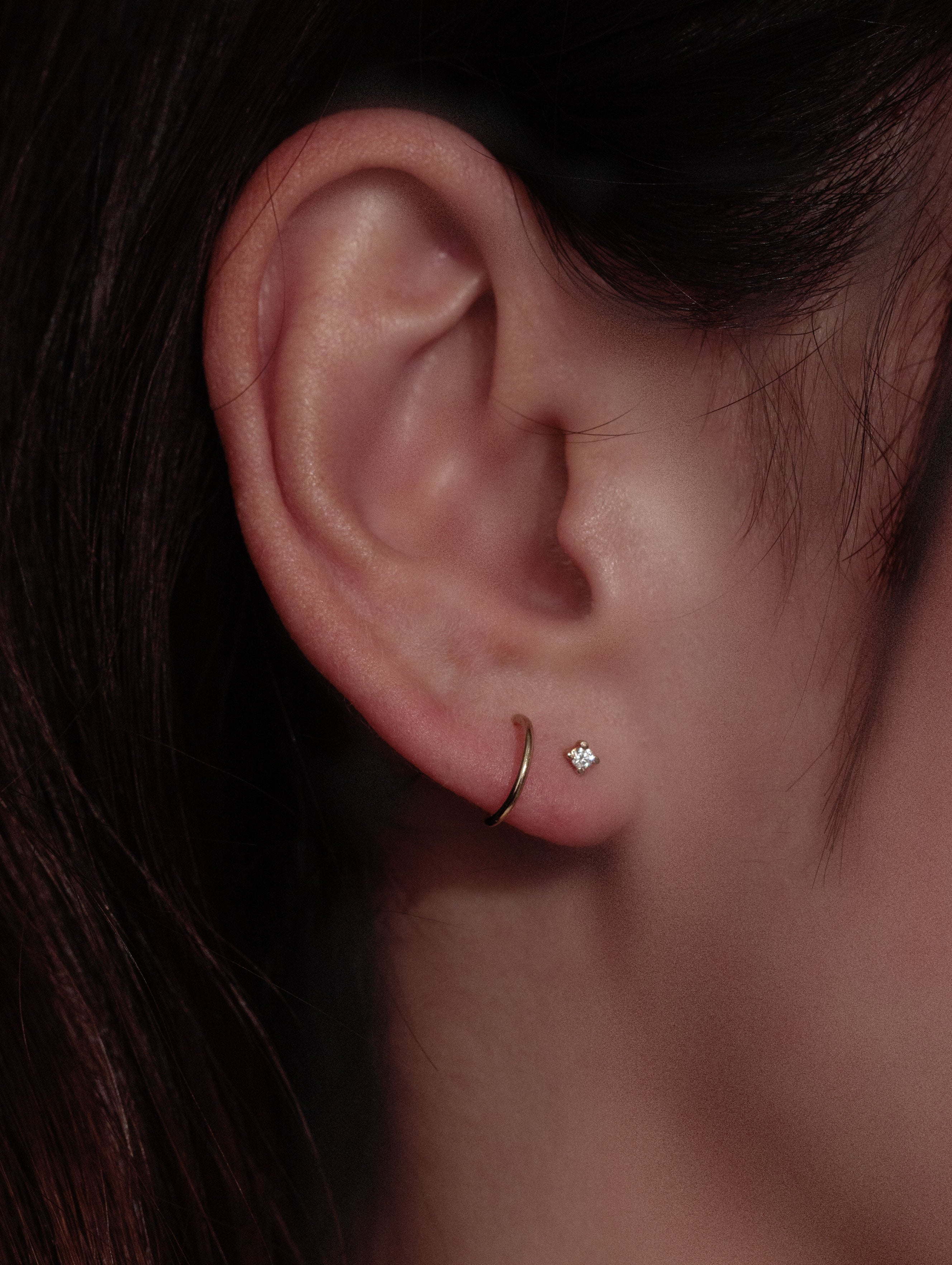 14K Diamond Twirl earring